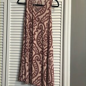 Cute dress. Material feels like butter.